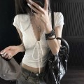 Pure and alluring white lace-trimmed cropped top